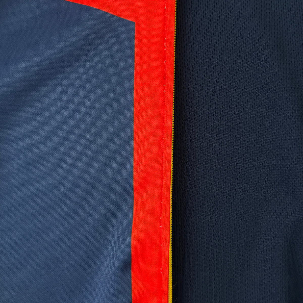 'ALL MIGHT' Track Jacket - zip and panel detail