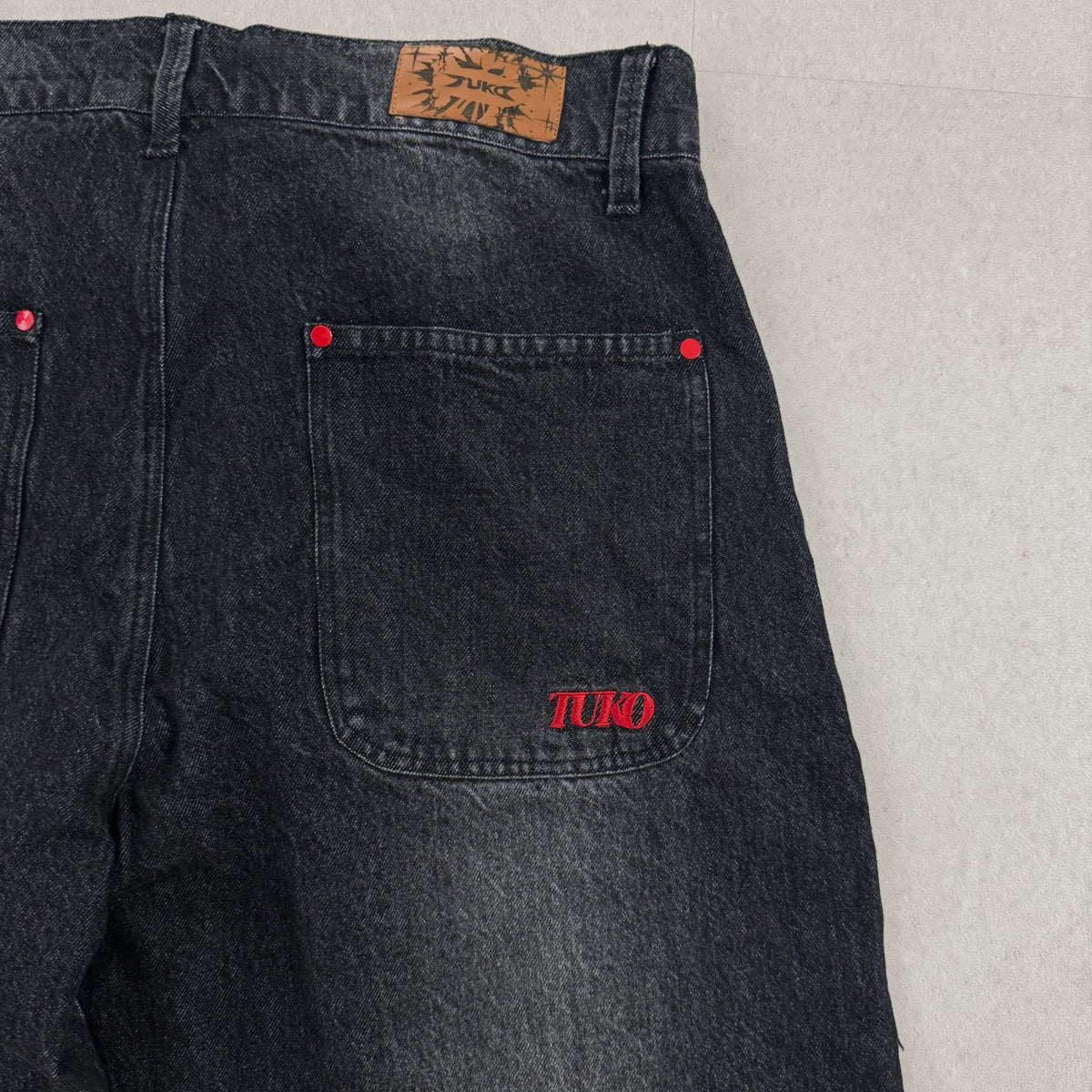 'DYNAMIGHT' Baggy Jeans - back pocket with red embroidered TUKO logo