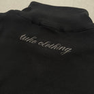 'PLUS ULTRA' Quarter Zip Knit - 'tuko clothing' script embroidery on the back