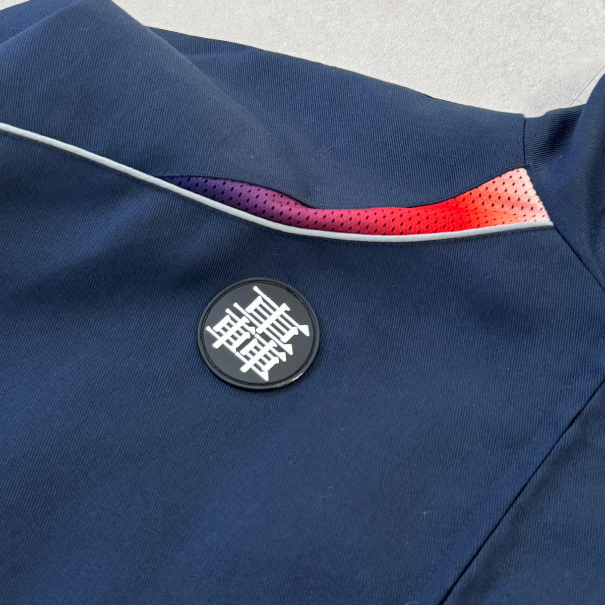 'HOT / COLD' Tech Jacket - rubber patch and gradient mesh panel detail