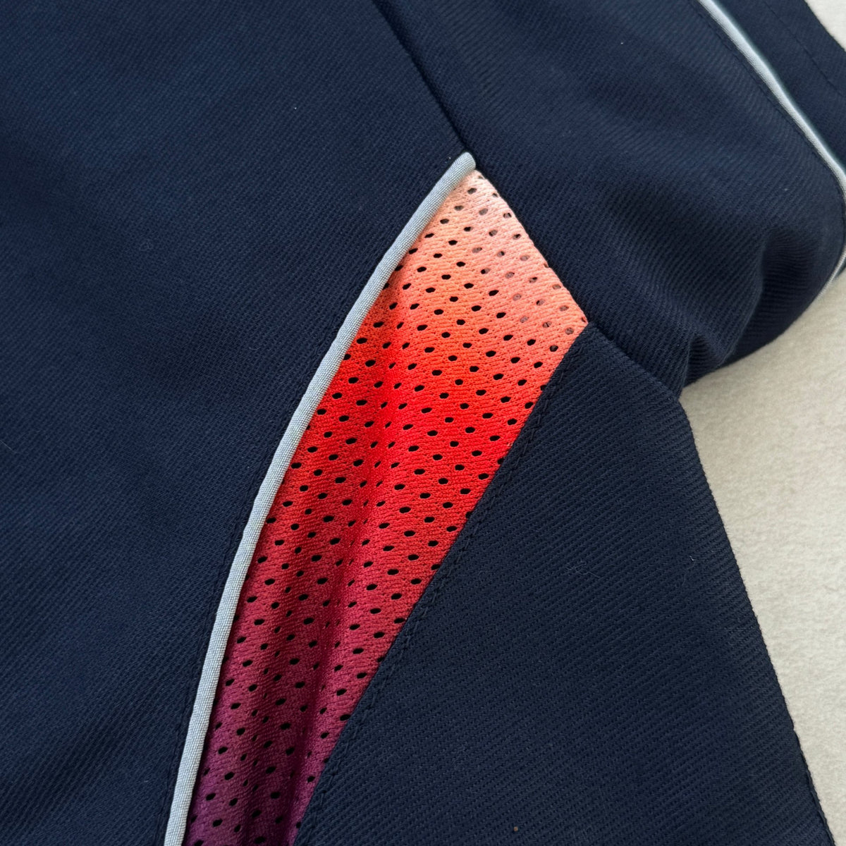 'HOT / COLD' Tech Jacket - gradient mesh panel close-up