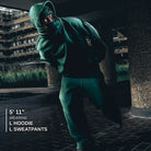 Size and fit reference - 5' 11" model wearing L hoodie and L sweatpants