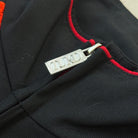 'HELLFIRE' Tech Jacket - TUKO zip puller detail