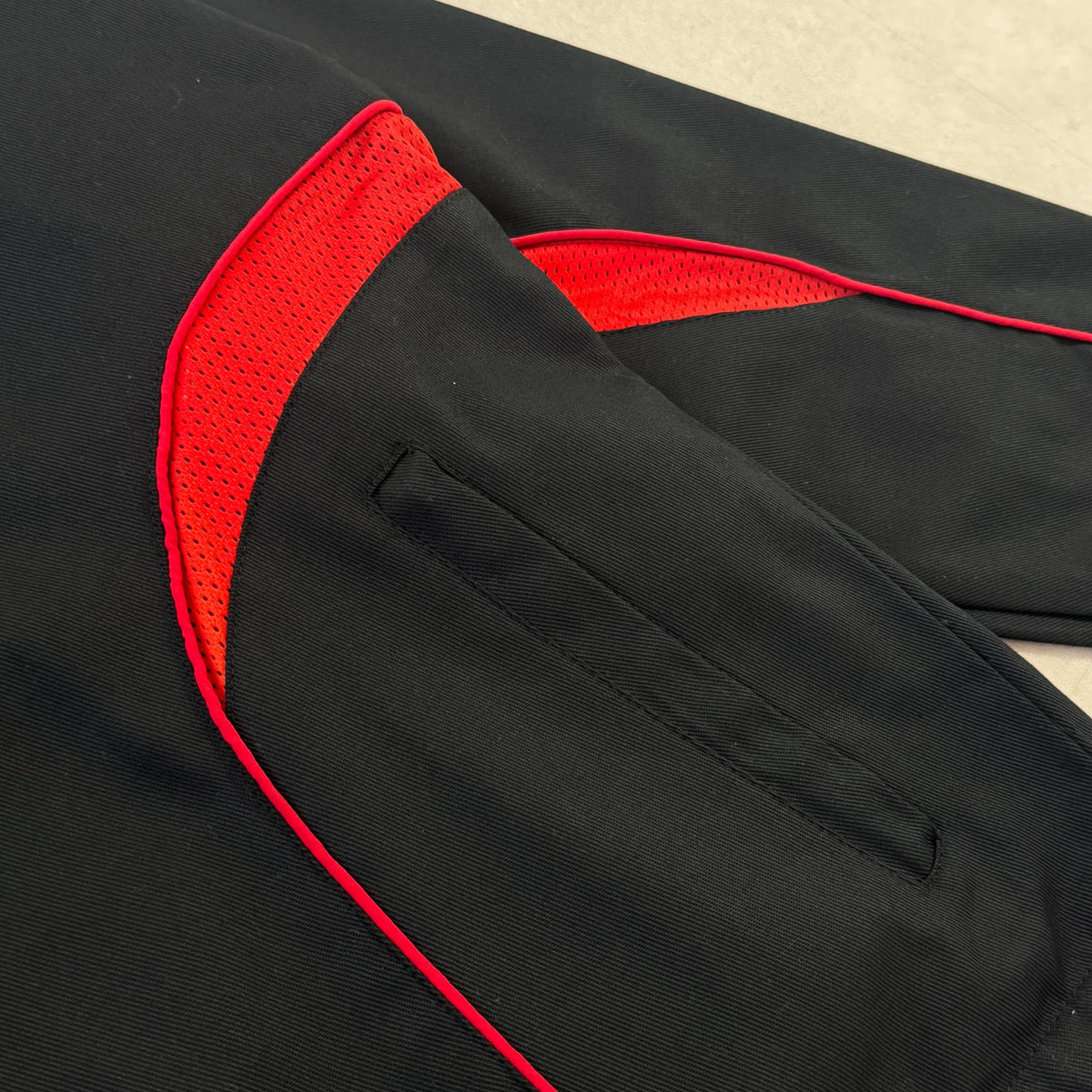 'HELLFIRE' Tech Jacket - zip side pocket and mesh panel detail